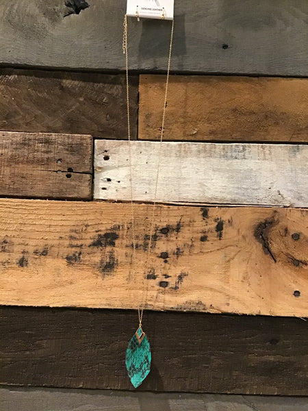 Long turquoise snakeskin pendant
