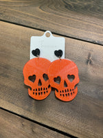 Large Orange Resin Skull Earrings